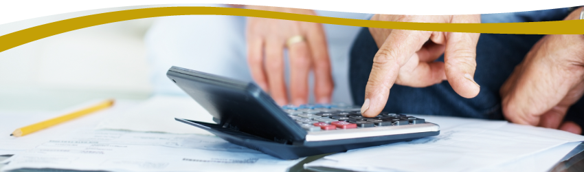 two seniors using calculator trying to determine assisted living costs two seniors using calculator trying to determine assisted living costs